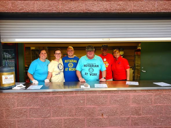 Local ROTARIANS "Pitch In" for the Sanford Mainers!